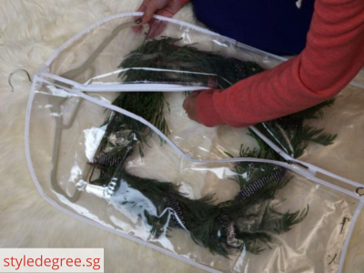 Suit bag - 10 Ways To Store Seasonal Wreaths